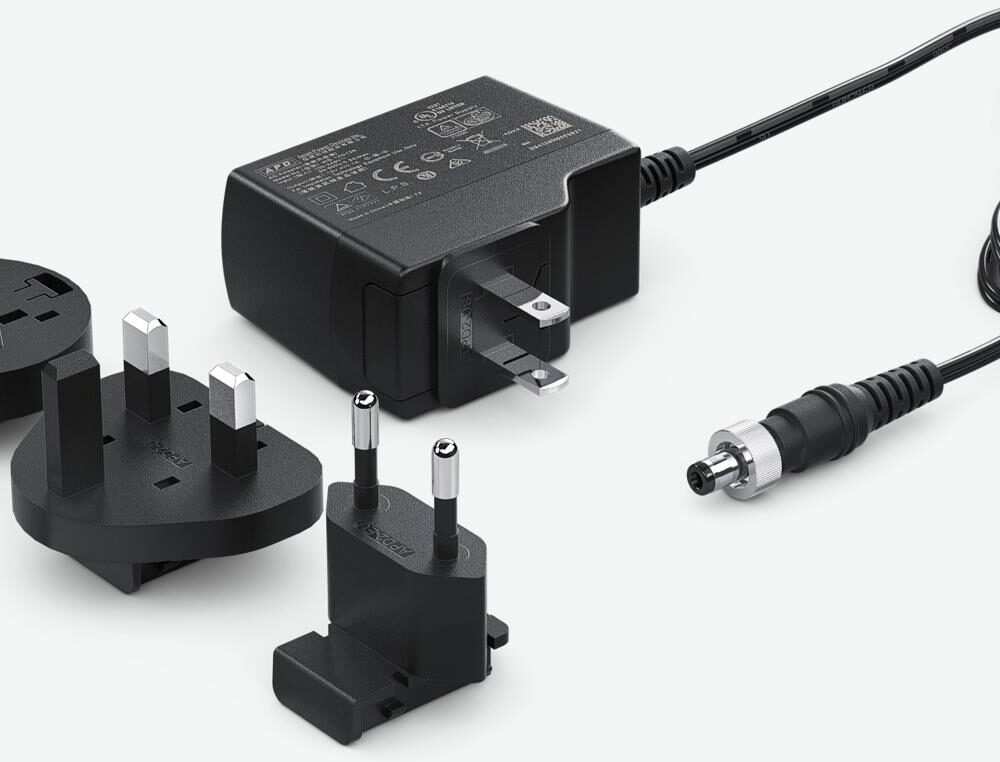 Blackmagic Design PSUPPLY-12V60WLOCK Netzteil & Spannungsumwandler Drinnen/Draußen 60 W Schwarz (BM-PSUPPLY-12V60WLOCK)